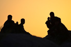 ANA Soldiers gather to enjoy the evening on the Al Masaak hill